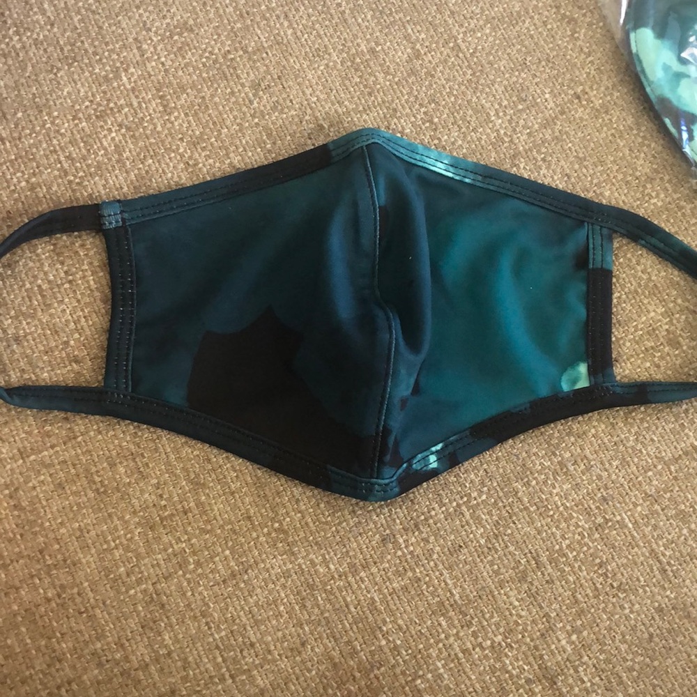 One Fabletics face mask. New in sealed bag.